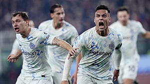 Inter edge Genoa to claim Serie A top spot