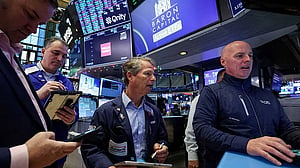 Wall Street closes lower as AI funding jitters drag tech stocks