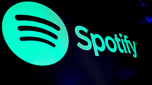 Spotify weighs $5.99 premium for added features, ticket access, Bloomberg News reports