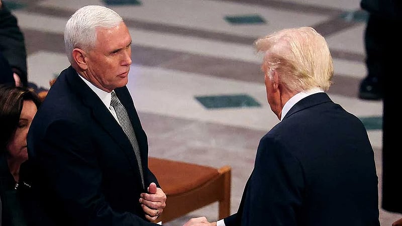Trump shakes hands with Pence, engages Obama at Carter funeral