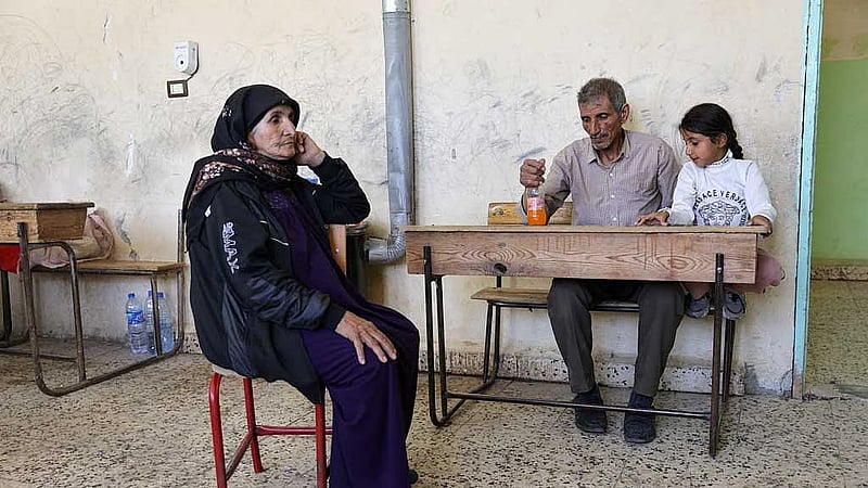 Bedouin civilians leave Syria's Sweida as tense truce holds