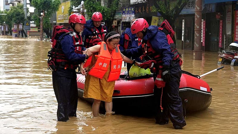 At least eight killed and dozens missing after floods on Nepal-China border