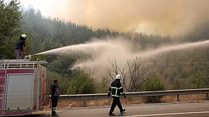 Firefighters struggle to contain wildfires as heatwave sears Turkey and Cyprus