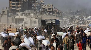 Israel announces daily pauses in Gaza fighting as aid airdrops begin