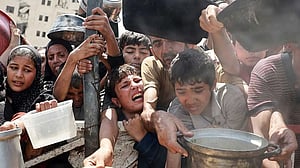Britain warns Israel it will recognise Palestinian state as Gaza starvation spreads