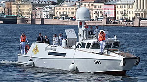 Ukrainian drones target St Petersburg as Putin attends scaled-down Navy Day