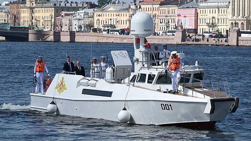 Ukrainian drones target St Petersburg as Putin attends scaled-down Navy Day