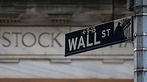 Wall Street knocked lower by tariff jitters, Musk's political plan hits Tesla