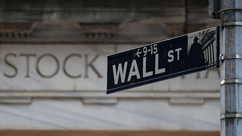 Wall Street knocked lower by tariff jitters, Musk's political plan hits Tesla