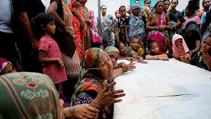 US officials survey Air India crash site, families continue to wait for bodies