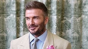 David Beckham knighted for services to sport and charity