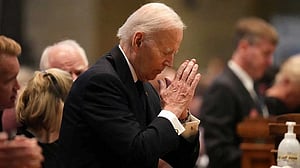 Biden joins thousands paying final respects to slain Minnesota lawmaker and husband