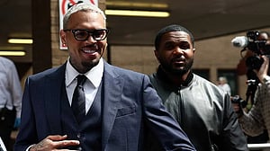 US singer Chris Brown pleads not guilty to lesser assault charge in UK court