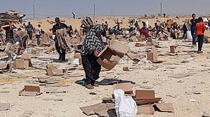 As death toll rises, Gazans make life-risking journeys to seek food
