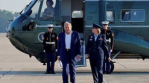 Heading to NATO summit, Trump casts doubt on mutual defence