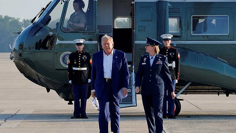 Heading to NATO summit, Trump casts doubt on mutual defence