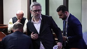 Georgia jails three opposition politicians, including bank founder