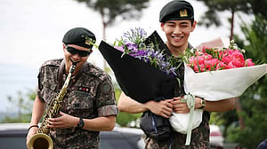 K-pop megastars RM, V released from army, promise BTS reunion
