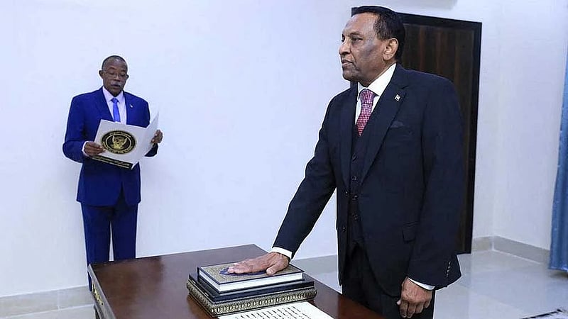 Sudan's prime minister dissolves government, state news agency reports
