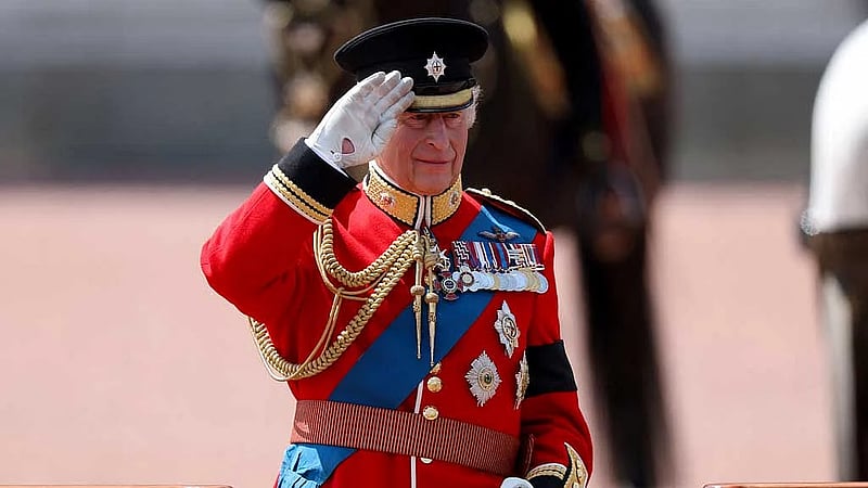 King Charles honours air crash victims at military parade
