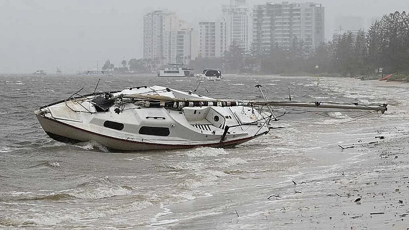Thousands of Australians without power as ex-tropical cyclone lashes Queensland