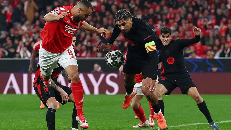 Flick proud of 10-man Barca's bravery in narrow win at Benfica