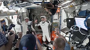 NASA astronauts head home on SpaceX capsule after drawn-out space station stay