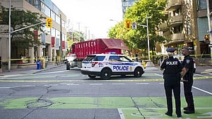 Toronto police seeking three suspects in pub shooting that injured 12