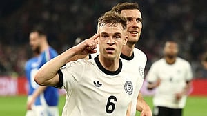 Germany waste three-goal lead but edge past Italy into Nations League semis