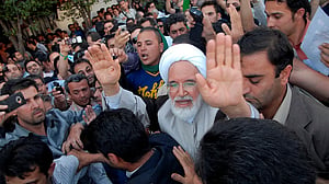 Iran opposition leader Karroubi to be freed from house arrest, his son says