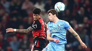 Leverkusen earn 3-1 win over Bochum to cut gap with leaders Bayern