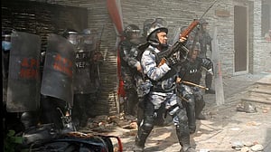 Two dead as Nepal police use tear gas, sticks to break up pro-monarchy rally