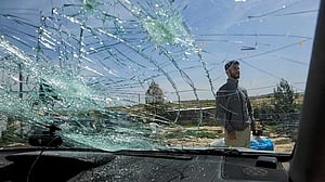 Oscar-winning Palestinian director injured in attack by Israeli settlers and arrested