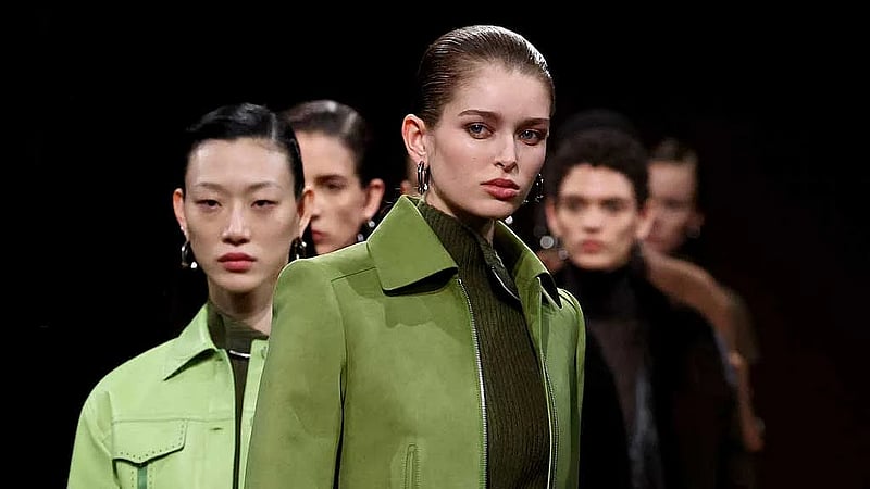 Hermes shows slick leather ensembles on dirt runway at Paris Fashion Week