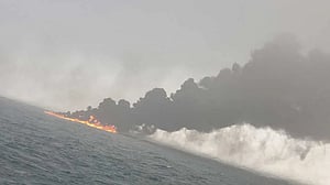 Tanker hired by US military ablaze off UK after hit by container ship