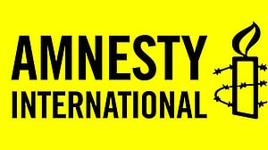Russia bans Amnesty International, which vows to redouble work on rights abuses