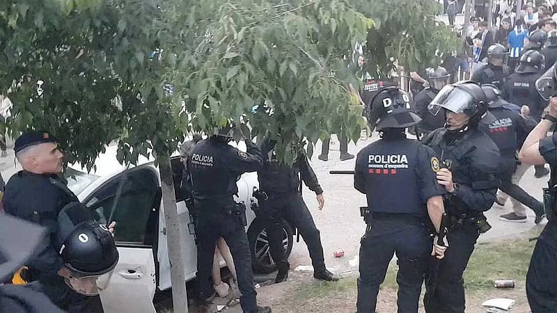 Thirteen hurt when car plows into crowd before Spanish football match