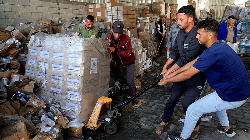 Deadly break in at UN warehouse as aid trickles into Gaza