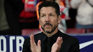 Atletico keen to keep improving to close gap with rivals, says Simeone