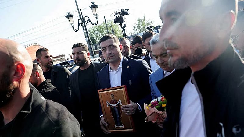 Romanian nationalist Simion seen ahead in election: exit polls