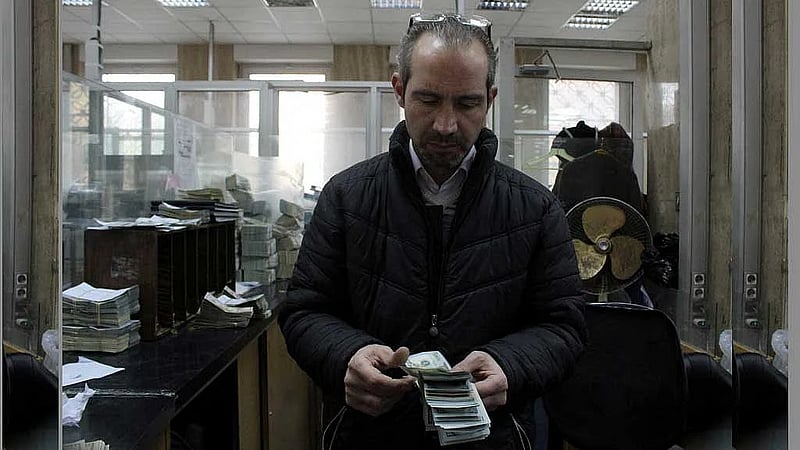 Qatari financing of Syrian salaries gets US go-ahead, sources say