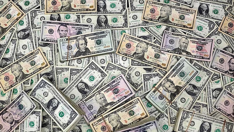 Dollar poised for third weekly gain as tariff concerns ease