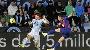 Lewandowski hat-trick steers Barcelona to 4-2 win at Celta Vigo