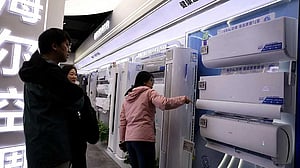China's factory output, retail sales growth worst in over a year
