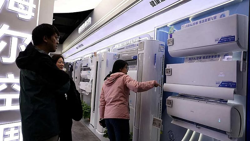 China's factory output, retail sales growth worst in over a year