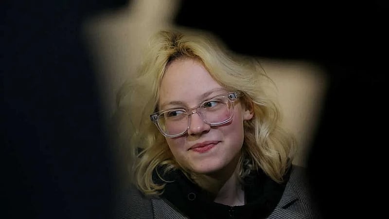 Teenage Russian street musician jailed over anti-Kremlin songs is detained as she leaves jail