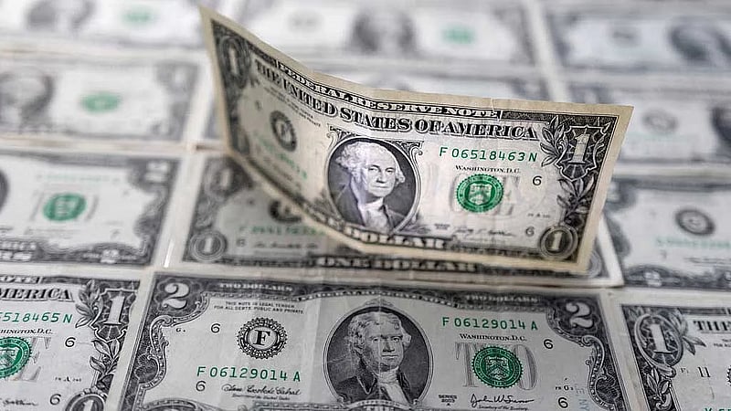 Dollar slumps on worries of what clearing US data fog might show