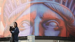 Iran's dual reality: As veil restrictions ease, political crackdown deepens
