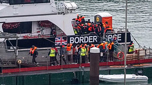 Britain to cut support for some asylum seekers in tougher migration overhaul