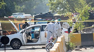 Suicide bombing in Pakistan capital kills 12, raises regional tension